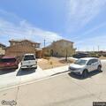 Person experiencing abdominal pain in Victorville