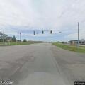 Driver reports black SUV tailgating and flashing lights