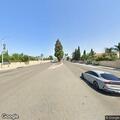 Bush burning in middle of intersection roadway