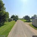 Tractor hauling mobile home creates traffic hazard