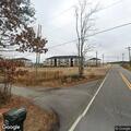 Man tearing down fence at Foster Road home