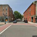 Person walking with shotgun near Howard and Remsen