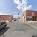Officers check suspicious man with bicycle in alley
