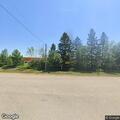 Person sleeping by Beaver Creek softball fields