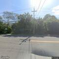 Disabled sedan on shoulder of Montauk Highway