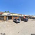 Disturbance involving weapon at business parking lot