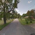 Tree partially blocking roadway on Thomas Road