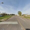Neighbor reports abandoned home with smoker burning