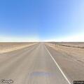 Vehicle rollover in field east of Highway 51