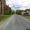 Deer struck and blocking road on Pleasant Street