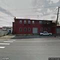 Complaint about man causing disturbance behind store