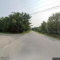 Baby deer blocking traffic on Hallowell Road