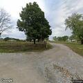 Man with chest pain and labored breathing on roadside
