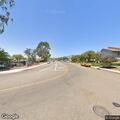 Vehicle blocking driveway in red zone