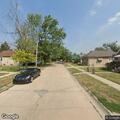 Woman reported wandering in yard and garage