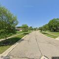Suspicious person reported looking into house windows