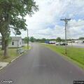 Downed wires and tree branch block traffic lanes