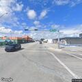 Gray SUV blocking traffic at Northwest 7th Avenue