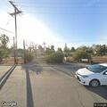 Person experiencing chest pain near nurses station