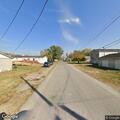 Yard damaged and person reported under camper