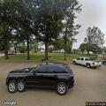 Search for damaged gray Nissan near Troy town square
