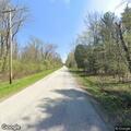 Suspicious person on bicycle in driveway
