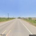Yellow box truck stopped after swerving on highway