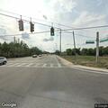 Traffic stop on red Honda Civic at intersection