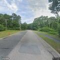 Loose dogs approach woman walking dog, no injuries
