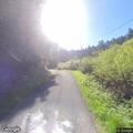 Person with head laceration in white minivan at Salmon Creek