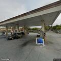 Report of person with knife at gas station