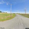 Downed utility lines on County Route 17 yard