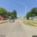 Male with leg lacerations near blue house in Carlyle