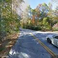 Tree blocking lane on Geer Highway near Cliff Ridge