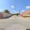 Person locked in running car in roadway