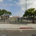 Erratic person fighting others near 109th Street in Lennox