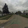 Man in maroon minivan yelling from vehicle