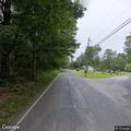 Tree branch smoking on power lines in Litchfield