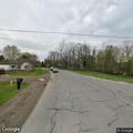 Person found unconscious with pill bottles in vehicle