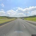 Drunk passenger walking on interstate near stopped car