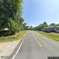 Abandoned unregistered vehicle near cannabis center