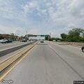 Car with flat tire in Norristown interchange lot