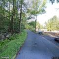 Person found in vehicle stopped at intersection with hazards on
