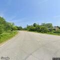 Low-hanging wire creating traffic hazard