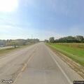 Disabled car left on roadside near Highway 51