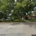 Person passed out behind vehicle wheel in Maxwell