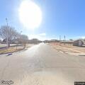Injured dog possibly hit by car at 4th and Chisum
