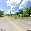 Truck rollover crash with driver standing outside