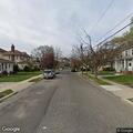 Person experiencing back pain at Clinton Ave