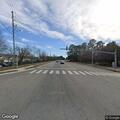 Possibly injured cat in roadway at intersection